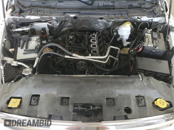 2014 Ram 1500 Big Horn with VIN 1C6RR7TT1ES467958, listed as a Copart auction lot 60890725 with 192,833 mi miles and Salvage title. Bid and sale history available at DreamBid. Image 11.