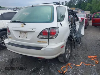2002 Lexus RX 300 with VIN JTJGF10U320144924, listed as a IAAI auction lot 42216686 with 253,797 mi miles and . Bid and sale history available at DreamBid. Image 4.