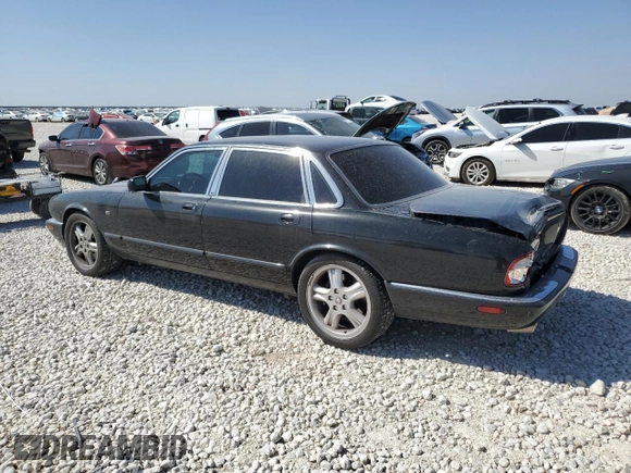 2002 Jaguar XJ with VIN SAJDA15BX2MF47193, listed as a Copart auction lot 49065275 with 69,544 mi miles and Salvage title. Bid and sale history available at DreamBid. Image 2.
