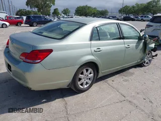2007 Toyota Avalon XL z VIN 4T1BK36B67U186025, wystawiony jako IAAI lot #41904650 z przebiegiem 127 081 mil mil oraz . Historia ofert i sprzedaży dostępna na DreamBid. Obrazek 4.