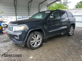 2012 Jeep Grand Cherokee Laredo with VIN 1C4RJEAG1CC316703, listed as a Copart auction lot 52128105 with 203,896 mi miles and Salvage Title. Bid and sale history available at carsss.com. Image 1.