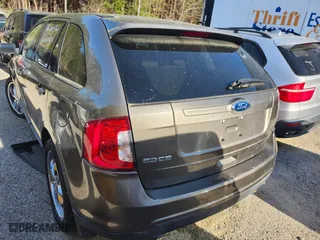 2012 Ford Edge SEL with VIN 2FMDK4JCXCBA76111, listed as a IAAI auction lot 41897405 with 172,161 mi miles. Bid and sale history available at carsss.com. Image 3.