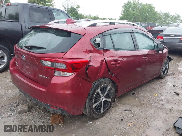 2023 Subaru Impreza Premium with VIN 4S3GTAV68P3701225, listed as a IAAI auction lot 42447232 with 42,983 mi miles and . Bid and sale history available at DreamBid. Image 4.