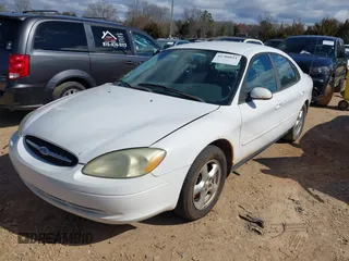 2003 Ford Taurus SE Standard with VIN 1FAFP53223A203718, listed as a IAAI auction lot 41708811 with 200,413 mi miles. Bid and sale history available at carsss.com. Image 2.