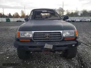 1996 Toyota Land Cruiser with VIN JT3HJ85JXT0142784, listed as a Copart auction lot 81755434 with 370,361 mi miles and Salvage Title. Bid and sale history available at carsss.com. Image 5.