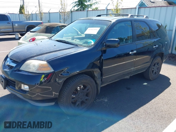 2006 Acura MDX Touring w/Navi with VIN 2HNYD18816H535148, listed as a IAAI auction lot 41982991 with 253,539 mi miles. Bid and sale history available at carsss.com. Image 2.