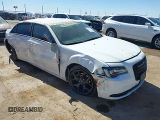 2023 Chrysler 300 Touring with VIN 2C3CCAAG0PH538214, listed as a IAAI auction lot 41662888 with 37,079 mi miles and . Bid and sale history available at DreamBid. Image 1.
