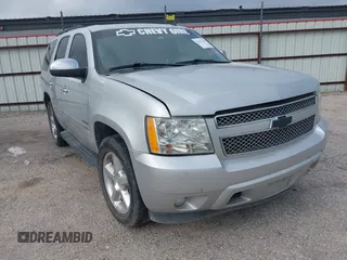 2011 Chevrolet Tahoe LTZ z VIN 1GNSCCE06BR110406, wystawiony jako IAAI lot #41611756 z przebiegiem 162 215 mil mil oraz . Historia ofert i sprzedaży dostępna na DreamBid. Obrazek 1.