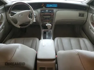 2003 Toyota Avalon XL z VIN 4T1BF28B03U280486, wystawiony jako Copart lot #57152935 z przebiegiem 131 996 mil mil oraz Szkoda całkowita • Salvage title. Historia ofert i sprzedaży dostępna na DreamBid. Obrazek 8.