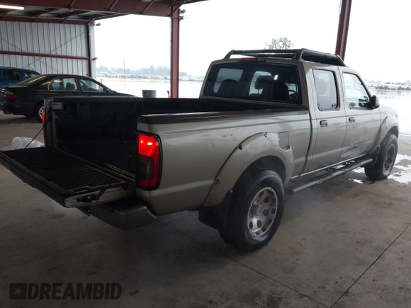 2003 Nissan Frontier SE z VIN 1N6ED29X73C438326, wystawiony jako IAAI lot #41437797 z przebiegiem 309 235 mil mil oraz . Historia ofert i sprzedaży dostępna na DreamBid. Obrazek 4.