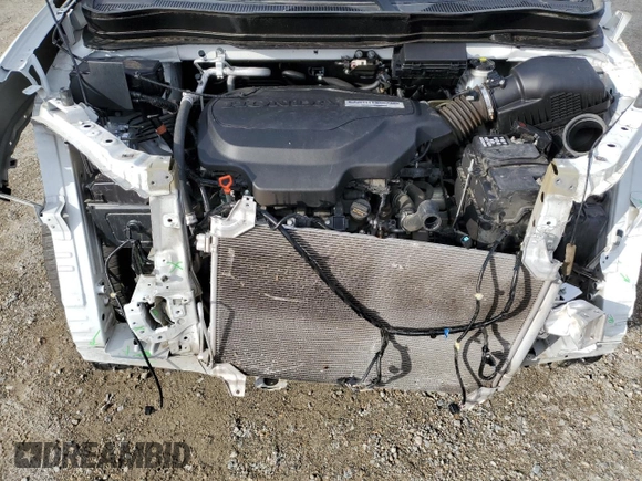 2020 Honda Passport Touring z VIN 5FNYF8H9XLB016652, wystawiony jako Copart lot #80346824 z przebiegiem 81 680 mil mil oraz Szkoda całkowita • Salvage title. Historia ofert i sprzedaży dostępna na DreamBid. Obrazek 12.