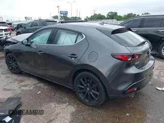 2021 Mazda 3 Premium z VIN JM1BPAML1M1318708, wystawiony jako IAAI lot #42178243 z przebiegiem 62 455 mil mil oraz . Historia ofert i sprzedaży dostępna na DreamBid. Obrazek 3.