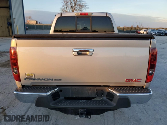 2011 GMC Canyon SLE1 with VIN 1GTD5MF99B8133327, listed as a Copart auction lot 82329864 with 213,115 mi miles and Salvage Title. Bid and sale history available at carsss.com. Image 6.