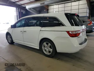 2011 Honda Odyssey Touring Elite with VIN 5FNRL5H90BB083092, listed as a Copart auction lot 54178785 with 135,765 mi miles and Salvage Title. Bid and sale history available at DreamBid. Image 2.
