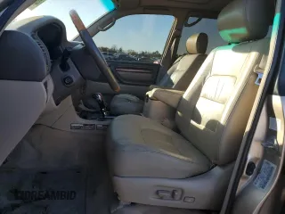 2000 Lexus LX 470 with VIN JT6HT00W2Y0120562, listed as a Copart auction lot 46861685 with 245,525 mi miles and Salvage Title. Bid and sale history available at DreamBid. Image 7.
