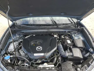 2024 Mazda CX-30 Premium z VIN 3MVDMBDY5RM616352, wystawiony jako Copart lot #68625774 z przebiegiem Nie podano mil oraz Szkody całkowita. Historia ofert i sprzedaży dostępna na DreamBid. Obrazek 12.