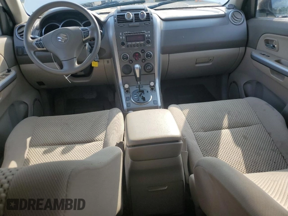 2010 Suzuki Grand Vitara Premium z VIN JS3TD0D24A4100983, wystawiony jako Copart lot #60311295 z przebiegiem 104 455 mil mil oraz Szkoda całkowita • Salvage title. Historia ofert i sprzedaży dostępna na DreamBid. Obrazek 8.