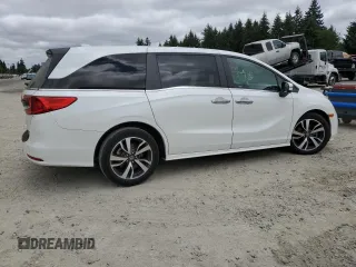 2022 Honda Odyssey Touring with VIN 5FNRL6H8XNB016064, listed as a Copart auction lot 65289595 with 24,946 mi miles and Salvage title. Bid and sale history available at DreamBid. Image 3.