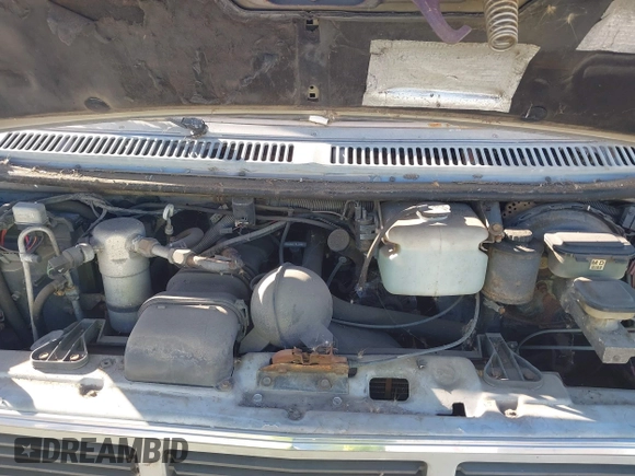 1989 GMC Vandura z VIN 1GDEG25K1K7521984, wystawiony jako IAAI lot #41371811 z przebiegiem 43 502 mil mil oraz . Historia ofert i sprzedaży dostępna na DreamBid. Obrazek 10.