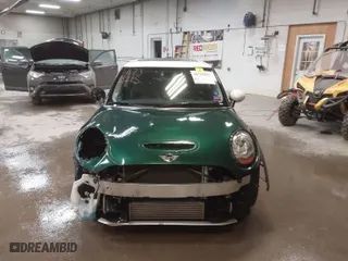2015 MINI Cooper Hardtop S with VIN WMWXP7C57F2A39384, listed as a IAAI auction lot 41733215 with 60,750 mi miles. Bid and sale history available at carsss.com. Image 13.