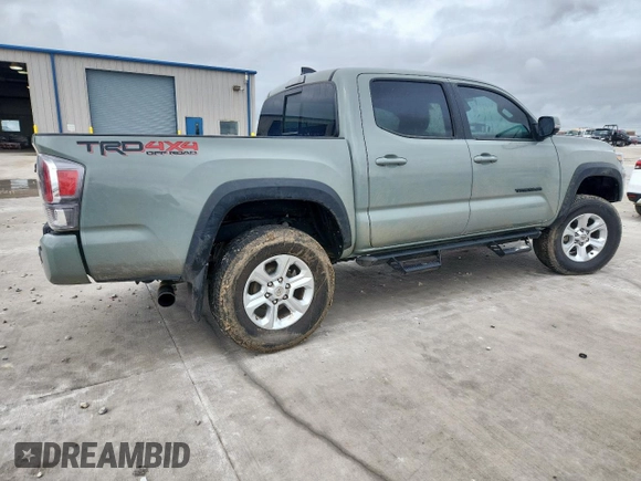 2023 Toyota Tacoma SR with VIN 3TMCZ5AN2PM580515, listed as a Copart auction lot 60422635 with 65,846 mi miles and Salvage title. Bid and sale history available at DreamBid. Image 3.