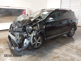 2018 Toyota RAV4 XLE with VIN 2T3WFREV1JW471931, listed as a IAAI auction lot 41332851 with 123,657 mi miles. Bid and sale history available at carsss.com. Image 19.
