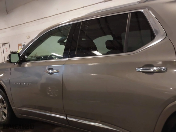 2018 Chevrolet Traverse Premier with VIN 1GNEVJKW0JJ165144, listed as a IAAI auction lot 41129951 with 137,593 mi miles. Bid and sale history available at carsss.com. Image 13.