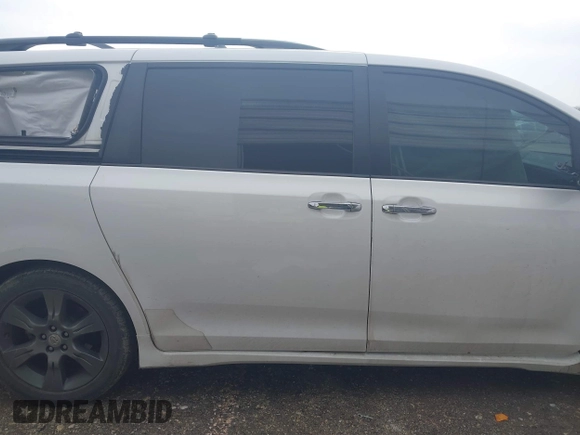 2015 Toyota Sienna SE с VIN 5TDXK3DC7FS599287, выставлен на аукционе IAAI как лот 41565671 с пробегом 111 626 миль миль и . История ставок и продаж доступна на DreamBid. Изображение 13.