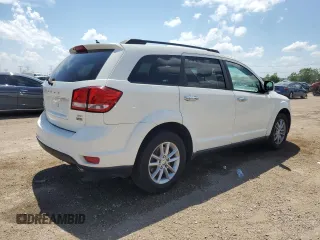 2015 Dodge Journey SXT with VIN 3C4PDCBG5FT628212, listed as a Copart auction lot 60663695 with 145,024 mi miles and Salvage title. Bid and sale history available at DreamBid. Image 3.