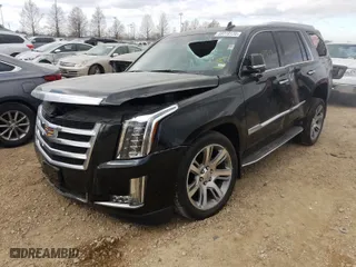 2015 Cadillac Escalade Luxury with VIN 1GYS4MKJ4FR665766, listed as a Copart auction lot 59316120 with 124,439 mi miles and Salvage Title. Bid and sale history available at carsss.com. Image 2.