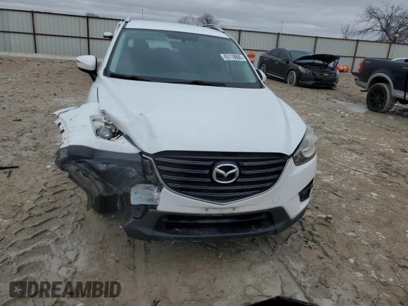 2016 Mazda CX-5 Touring with VIN JM3KE2CY9G0733933, listed as a Copart auction lot 45118885 with 149,901 mi miles and Salvage Title. Bid and sale history available at carsss.com. Image 5.