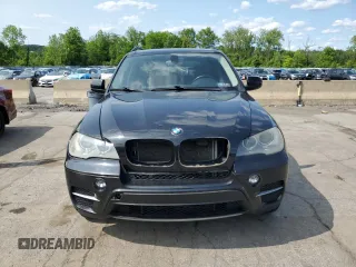 2012 BMW X5 35i with VIN 5UXZV4C59CL752661, listed as a Copart auction lot 58590305 with 101,725 mi miles and Salvage title. Bid and sale history available at DreamBid. Image 5.