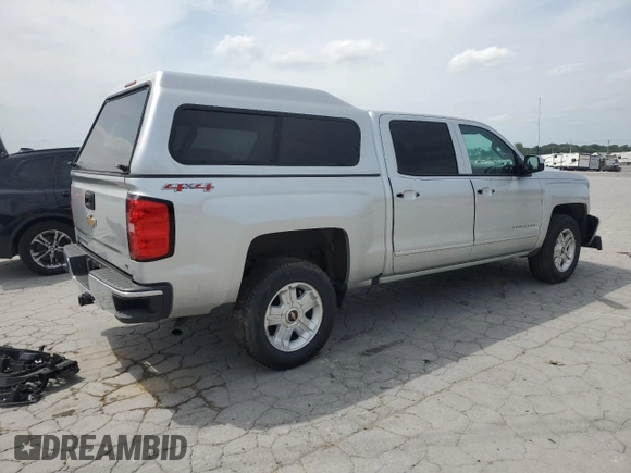 2017 Chevrolet Silverado 1500 LT with VIN 3GCUKREC3HG320455, listed as a Copart auction lot 57124395 with 119,683 mi miles and Salvage Title. Bid and sale history available at DreamBid. Image 3.