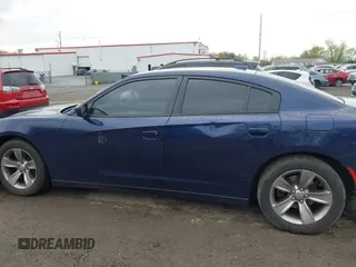 2015 Dodge Charger SXT with VIN 2C3CDXHG5FH878642, listed as a IAAI auction lot 42035569 with 228,000 mi miles and . Bid and sale history available at DreamBid. Image 14.