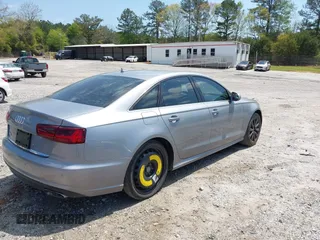 2016 Audi A6 Premium z VIN WAUCFAFC2GN111968, wystawiony jako IAAI lot #42003738 z przebiegiem 149 089 mil mil oraz . Historia ofert i sprzedaży dostępna na DreamBid. Obrazek 4.