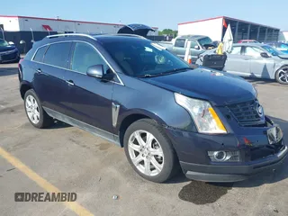 2014 Cadillac SRX Performance Collection with VIN 3GYFNCE39ES613051, listed as a IAAI auction lot 42113063 with 82,952 mi miles. Bid and sale history available at carsss.com. Image 1.