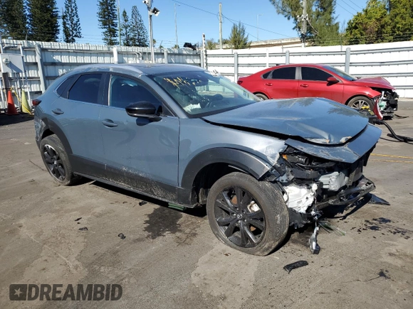 2023 Mazda CX-30 2.5 S Carbon Edition with VIN 3MVDMBCM5PM508471, listed as a Copart auction lot 87279944 with 29,756 mi miles and Non Repairable. Bid and sale history available at carsss.com. Image 4.