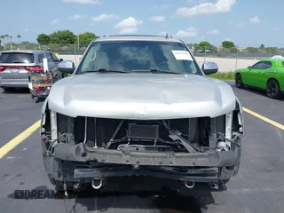 2013 Chevrolet Suburban LT with VIN 1GNSCJE08DR378459, listed as a IAAI auction lot 42453650 with 179,156 mi miles and . Bid and sale history available at DreamBid. Image 13.