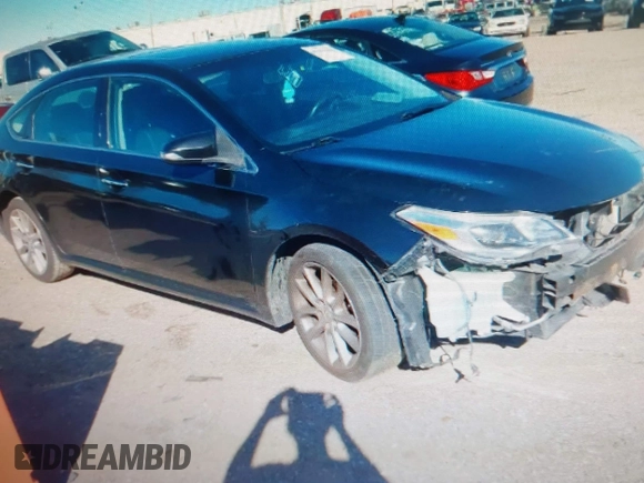 2014 Toyota Avalon Limited with VIN 4T1BK1EB4EU096164, listed as a IAAI auction lot 40904808 with 242,086 mi miles. Bid and sale history available at carsss.com. Image 1.