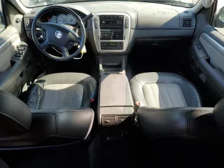 2004 Mercury Mountaineer Convenience z VIN 4M2ZU86W24ZJ08590, wystawiony jako Copart lot #56845865 z przebiegiem 120 928 mil mil oraz Szkody całkowita. Historia ofert i sprzedaży dostępna na DreamBid. Obrazek 8.