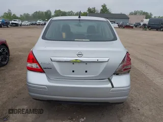 2010 Nissan Versa S with VIN 3N1BC1AP9AL404584, listed as a IAAI auction lot 42367293 with 158,377 mi miles and . Bid and sale history available at DreamBid. Image 16.