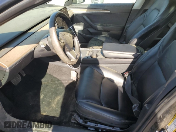 2022 Tesla Model 3 with VIN 5YJ3E1EAXNF286180, listed as a Copart auction lot 52299105 with 129,824 mi miles and Clean Title. Bid and sale history available at carsss.com. Image 7.
