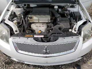 2012 Mitsubishi Galant FE z VIN 4A32B2FF1CE019686, wystawiony jako Copart lot #55268385 z przebiegiem 194 351 mil mil oraz Szkoda całkowita • Salvage title. Historia ofert i sprzedaży dostępna na DreamBid. Obrazek 11.