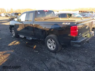 2017 Chevrolet Silverado 1500 LT with VIN 1GCVKREC8HZ331875, listed as a IAAI auction lot 40960777 with 147,157 mi miles. Bid and sale history available at carsss.com. Image 3.