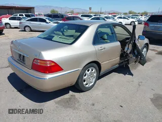 2000 Acura RL with VIN JH4KA9656YC001269, listed as a IAAI auction lot 41831469 with 158,504 mi miles. Bid and sale history available at carsss.com. Image 4.