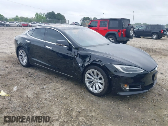 2017 Tesla Model S 60 with VIN 5YJSA1E1XHF232745, listed as a IAAI auction lot 41986834 with 89,581 mi miles and . Bid and sale history available at DreamBid. Image 1.