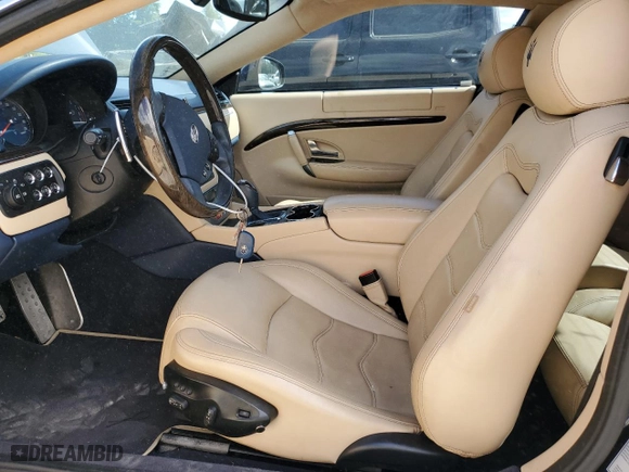 2012 Maserati GranTurismo S with VIN ZAM45KLAXC0063982, listed as a Copart auction lot 58490074 with 25,194 mi miles and Salvage Title. Bid and sale history available at carsss.com. Image 7.