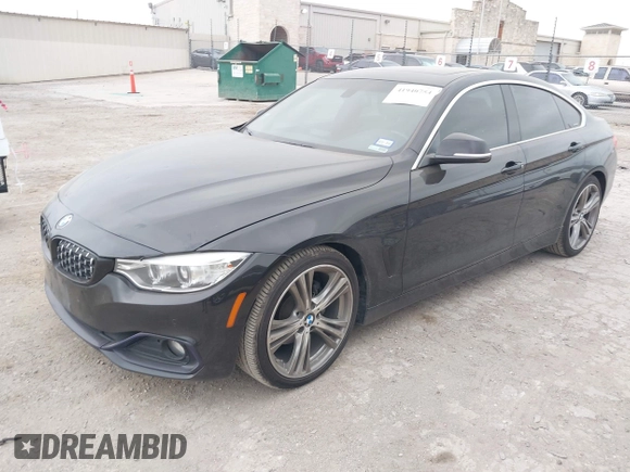 2016 BMW 4 Series 428i with VIN WBA4A9C51GG506512, listed as a IAAI auction lot 41940754 with 144,999 mi miles and . Bid and sale history available at DreamBid. Image 2.