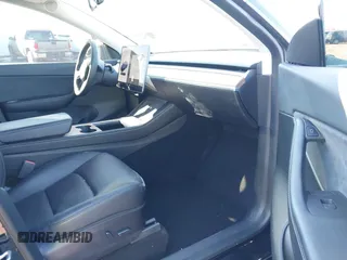 2022 Tesla Model Y Performance with VIN 7SAYGDEFXNF313636, listed as a IAAI auction lot 41660019 with 30,258 mi miles and . Bid and sale history available at DreamBid. Image 5.