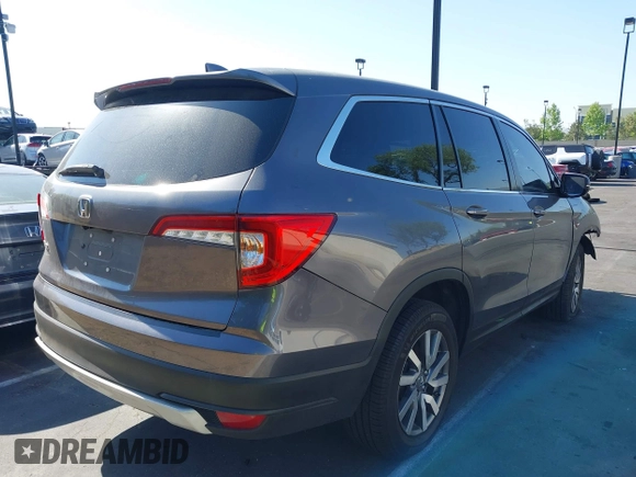 2021 Honda Pilot EX with VIN 5FNYF5H35MB036402, listed as a IAAI auction lot 42280114 with Not provided miles and . Bid and sale history available at DreamBid. Image 4.